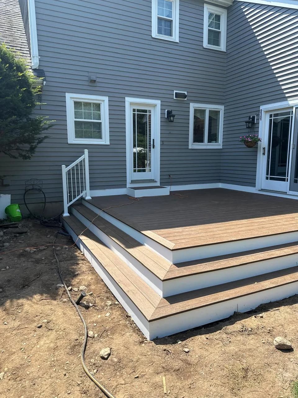 Two-tone composite deck with wide cascading steps