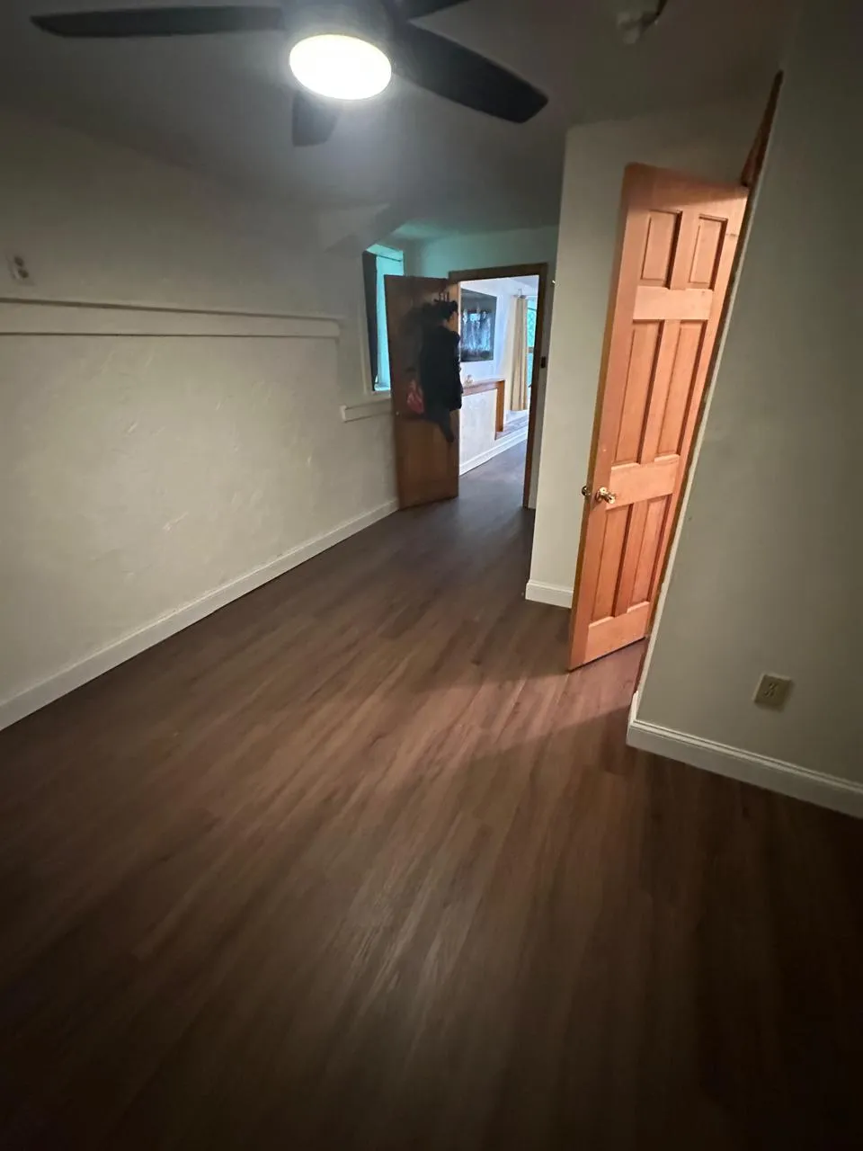 Interior room with new luxury vinyl plank flooring and fresh trim